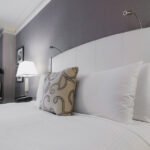bright-hotel-room-bed